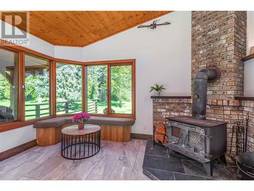 12474 Greystokes Road, Kelowna, BC - Indoor Photo Showing Other Room With Fireplace