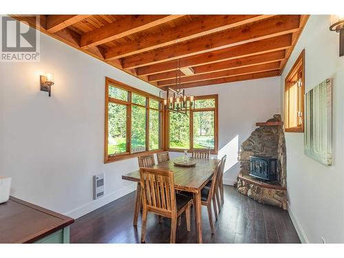 12474 Greystokes Road, Kelowna, BC - Indoor Photo Showing Dining Room With Fireplace