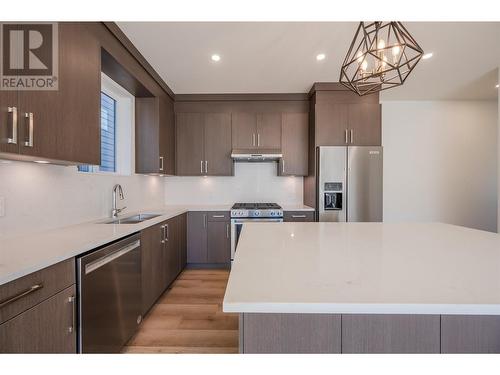 1701 Fairford Drive Unit# 101, Penticton, BC - Indoor Photo Showing Kitchen With Stainless Steel Kitchen With Double Sink With Upgraded Kitchen