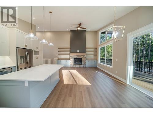 233 Shadow Mountain Boulevard Boulevard, Cranbrook, BC - Indoor Photo Showing Kitchen With Fireplace With Upgraded Kitchen