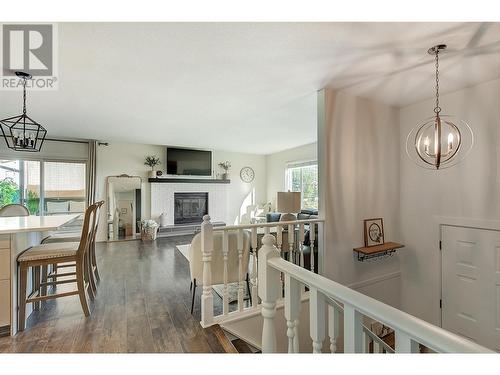 3314 Mcginnis Road, West Kelowna, BC - Indoor Photo Showing Dining Room With Fireplace