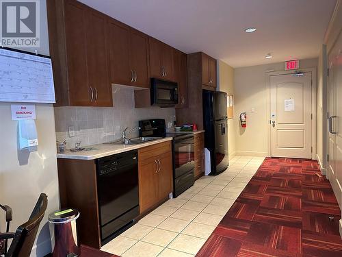 1950 Durnin Road Unit# 407, Kelowna, BC - Indoor Photo Showing Kitchen With Double Sink