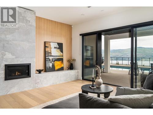 1412 Vineyard Drive, West Kelowna, BC - Indoor Photo Showing Living Room With Fireplace