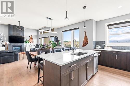 900 Mt Ida Drive Unit# 32, Vernon, BC - Indoor Photo Showing Kitchen With Fireplace With Double Sink