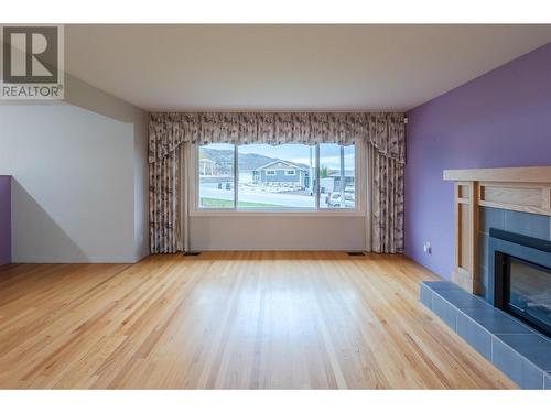 1077 Maccleave Avenue, Penticton, BC - Indoor Photo Showing Living Room With Fireplace