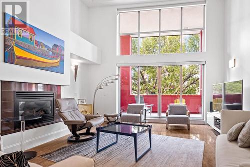 136 Front Street Unit# 203, Penticton, BC - Indoor Photo Showing Living Room With Fireplace