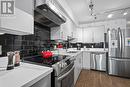 136 Front Street Unit# 203, Penticton, BC  - Indoor Photo Showing Kitchen With Double Sink 