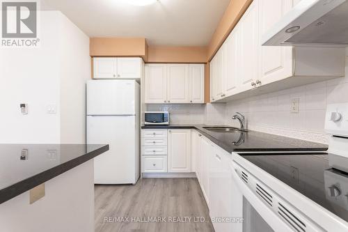 827 - 3888 Duke Of York Boulevard, Mississauga, ON - Indoor Photo Showing Kitchen With Double Sink