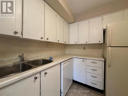 306 - 1300 Marlborough Court, Oakville, ON - Indoor Photo Showing Kitchen With Double Sink