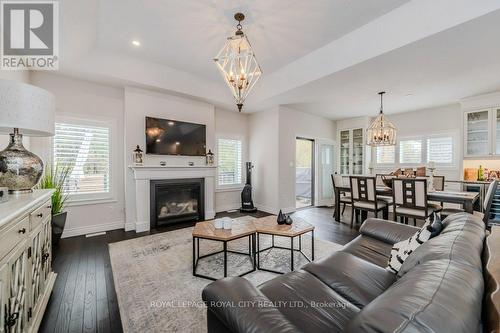 380 Rogers Road, North Perth, ON - Indoor Photo Showing Living Room With Fireplace