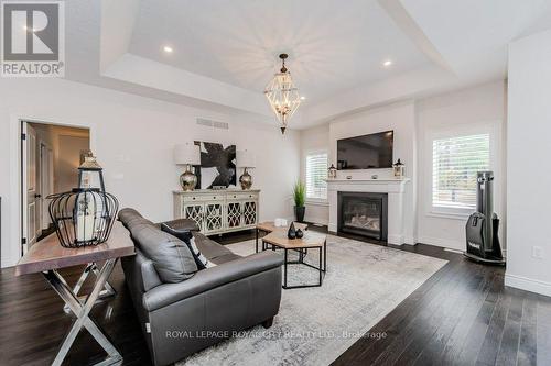 380 Rogers Road, North Perth, ON - Indoor Photo Showing Living Room With Fireplace