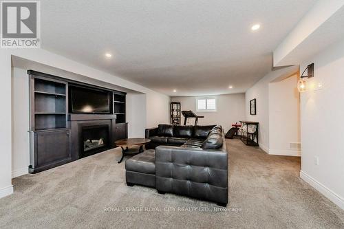 380 Rogers Road, North Perth, ON - Indoor Photo Showing Living Room With Fireplace