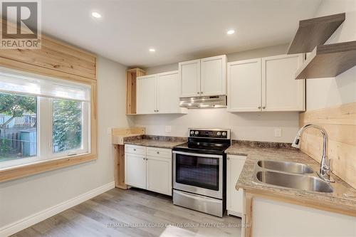 148 Crosthwaite Avenue N, Hamilton, ON - Indoor Photo Showing Kitchen With Double Sink