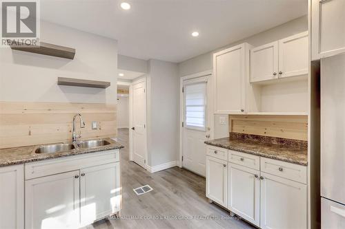 148 Crosthwaite Avenue N, Hamilton, ON - Indoor Photo Showing Kitchen With Double Sink