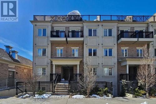 266 - 19 Coneflower Crescent, Toronto, ON - Outdoor With Facade