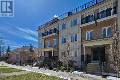 266 - 19 Coneflower Crescent, Toronto, ON - Outdoor With Facade