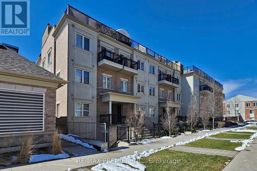 266 - 19 Coneflower Crescent, Toronto, ON - Outdoor With Facade