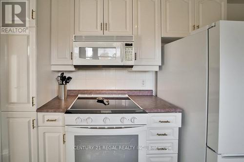 56 Somerdale Square, Toronto, ON - Indoor Photo Showing Kitchen