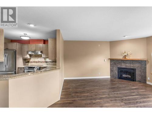 338 Nicola Street Unit# 305, Kamloops, BC - Indoor Photo Showing Kitchen With Fireplace