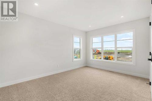 107 Chelsea Channel, Chestermere, AB - Indoor Photo Showing Other Room