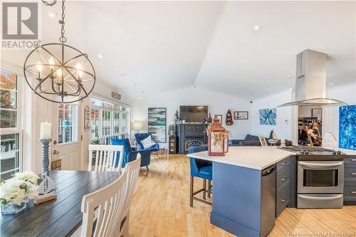 14 Wry'S Lane, Bass River, NB - Indoor Photo Showing Dining Room With Fireplace