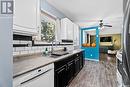 1223 Athabasca Street W, Moose Jaw, SK  - Indoor Photo Showing Kitchen With Double Sink 