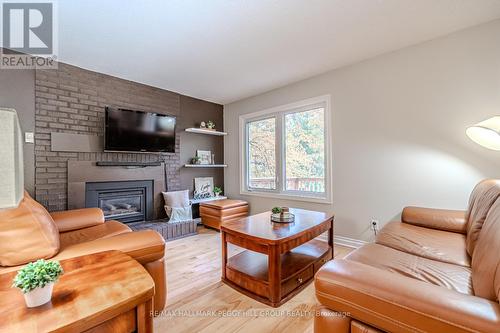 103 Browning Trail, Barrie, ON - Indoor Photo Showing Living Room With Fireplace