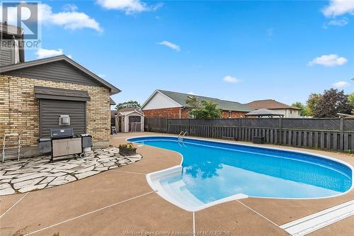 103 Pierella Drive, Lakeshore, ON - Outdoor With In Ground Pool With Backyard