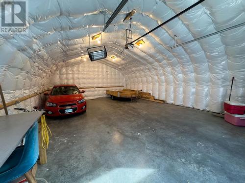 5003 Smith Road, 108 Mile Ranch, BC - Indoor Photo Showing Garage