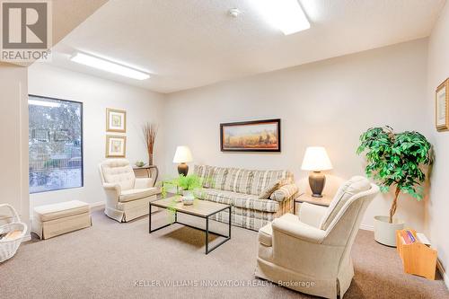 209 - 260 Sheldon Avenue N, Kitchener, ON - Indoor Photo Showing Living Room