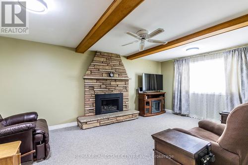 20 Ridout Street, Brockton, ON - Indoor Photo Showing Living Room With Fireplace