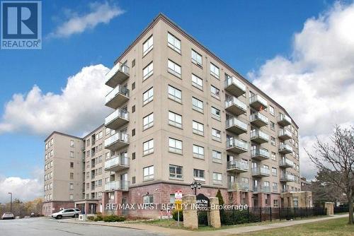 501 - 7405 Goreway Drive, Mississauga, ON - Outdoor With Balcony With Facade