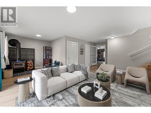 2084 Pinewinds Place, Okanagan Falls, BC - Indoor Photo Showing Living Room With Fireplace