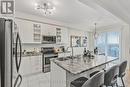 57 Martin Trail, New Tecumseth, ON  - Indoor Photo Showing Kitchen With Stainless Steel Kitchen With Double Sink With Upgraded Kitchen 