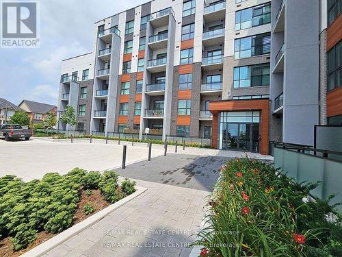 502 - 50 Kaitting Trail, Oakville, ON - Outdoor With Balcony With Facade