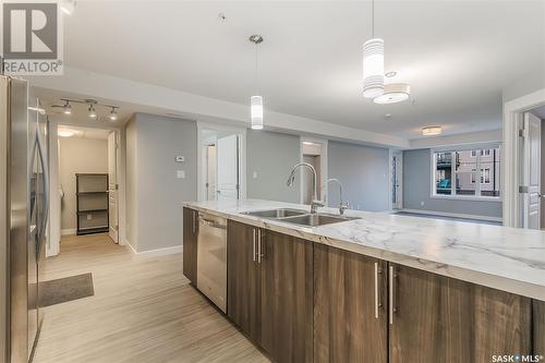 322 5301 Universal Crescent, Regina, SK - Indoor Photo Showing Kitchen With Double Sink With Upgraded Kitchen