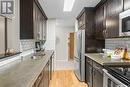 304 130 Edinburgh Place, Saskatoon, SK  - Indoor Photo Showing Kitchen With Stainless Steel Kitchen 