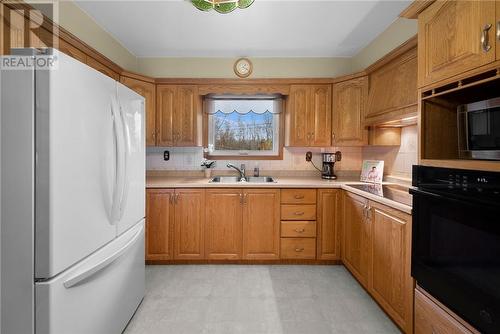 68 Walter Street, Coniston, ON - Indoor Photo Showing Kitchen With Double Sink