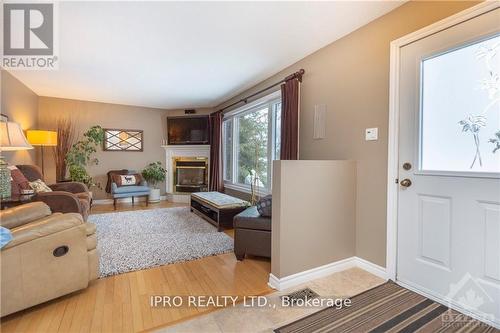 1436 Boyer Road, Ottawa, ON - Indoor Photo Showing Living Room With Fireplace