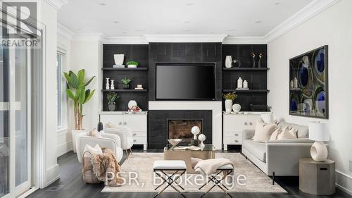 14 Tregellis Road, Toronto, ON - Indoor Photo Showing Living Room With Fireplace