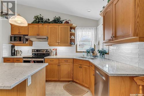 1003 Wright Place, Saskatoon, SK - Indoor Photo Showing Kitchen With Double Sink