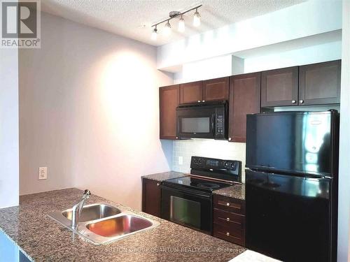 1210 - 3525 Kariya Drive, Mississauga, ON - Indoor Photo Showing Kitchen With Double Sink