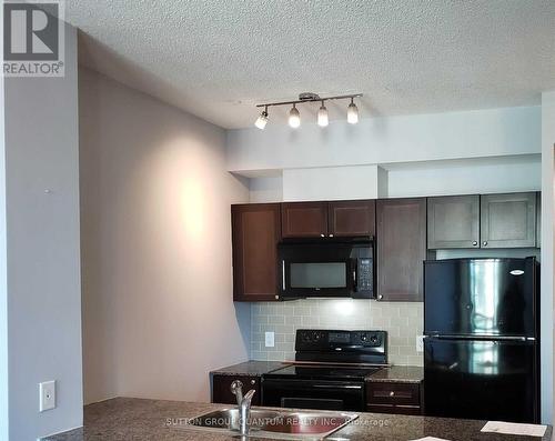 1210 - 3525 Kariya Drive, Mississauga, ON - Indoor Photo Showing Kitchen With Double Sink