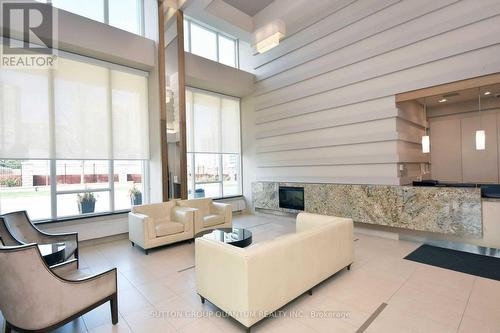 1210 - 3525 Kariya Drive, Mississauga, ON - Indoor With Fireplace