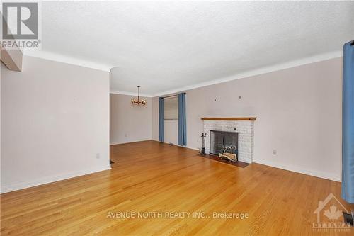 213 Ancaster Avenue, Ottawa, ON - Indoor Photo Showing Living Room With Fireplace