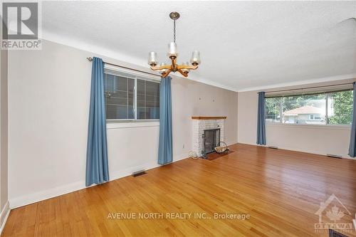 213 Ancaster Avenue, Ottawa, ON - Indoor Photo Showing Living Room With Fireplace