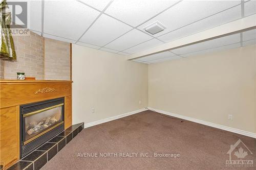 213 Ancaster Avenue, Ottawa, ON - Indoor Photo Showing Other Room With Fireplace