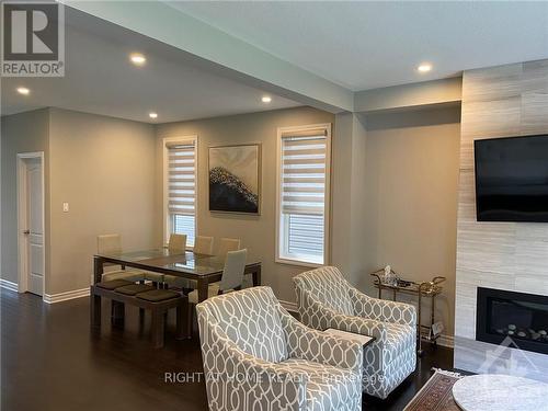 232 Saddleback Crescent, Ottawa, ON - Indoor Photo Showing Living Room With Fireplace