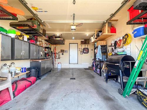 7 Boschman Bay, Brandon, MB - Indoor Photo Showing Garage