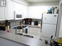 1160 Hugh Allan Drive Unit# 203, Kamloops, BC  - Indoor Photo Showing Kitchen With Double Sink 